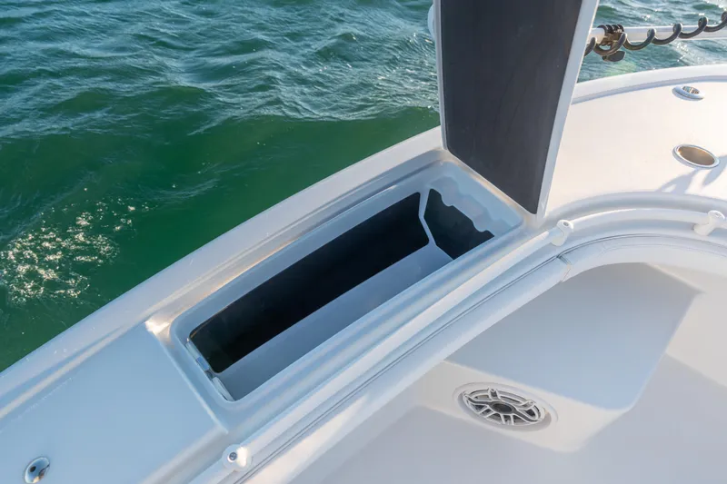  Yacht Photos Pics Open storage compartment on 2020 BARKER 26 boat, with ocean background.