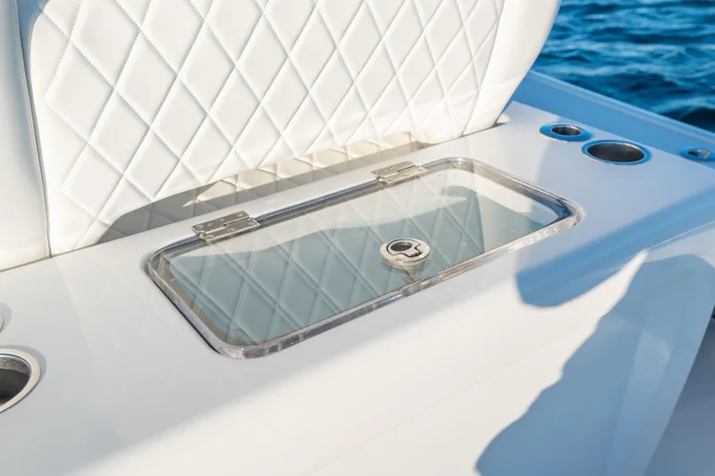  Yacht Photos Pics Luxury seating and storage on 2020 BARKER 26 boat, featuring diamond-stitched upholstery.
