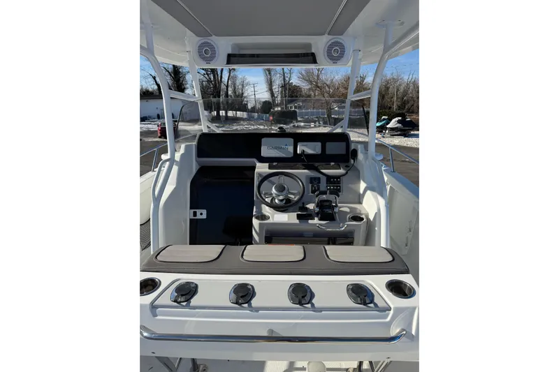 Jeanneau Leader 9.0 Cc Yacht Photos Pics 2019 Jeanneau Leader 9.0 CC boat cockpit with modern steering and controls.