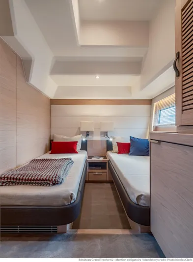 Yacht Photos Pics 2025 Beneteau Grand Trawler 62 cabin with twin beds, modern design, cozy ambiance.
