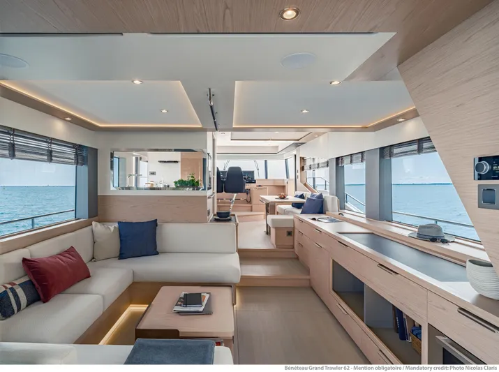  Yacht Photos Pics Luxurious interior of 2025 Beneteau Grand Trawler 62 yacht with modern furnishings.