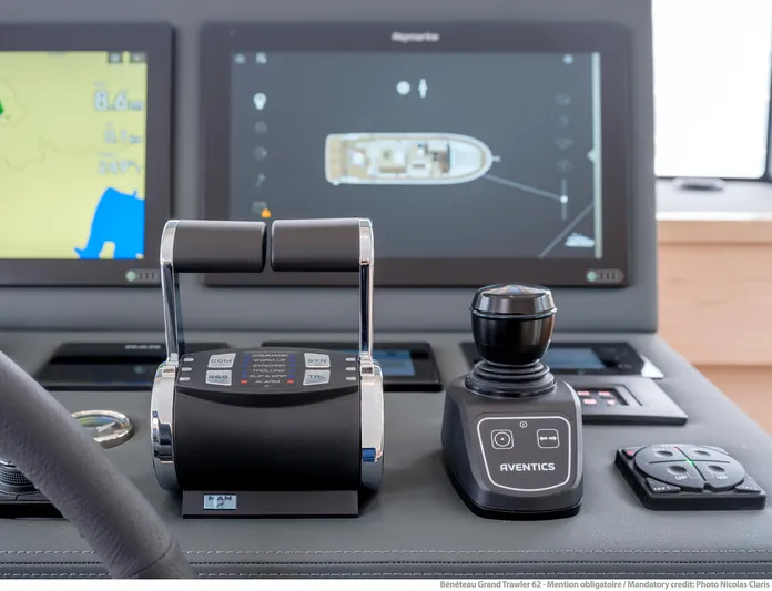  Yacht Photos Pics Control panel of 2025 Beneteau Grand Trawler 62 with advanced navigation displays.