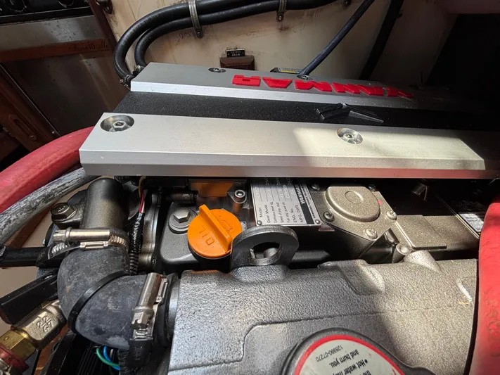 Pacific Seacraft Crealock 37 Yacht Photos Pics Engine compartment of a 1995 Pacific Seacraft Crealock 37 sailboat, featuring a Yanmar engine.