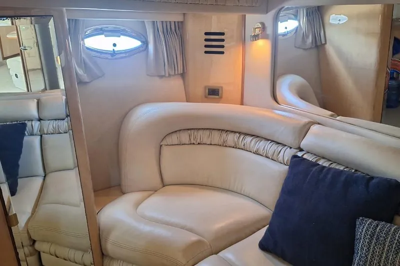 2000 Sea Ray 460 Sundancer @ Ixtapa Yacht Photos Pics Luxurious interior of 2000 Sea Ray 460 Sundancer yacht with plush seating and elegant decor.