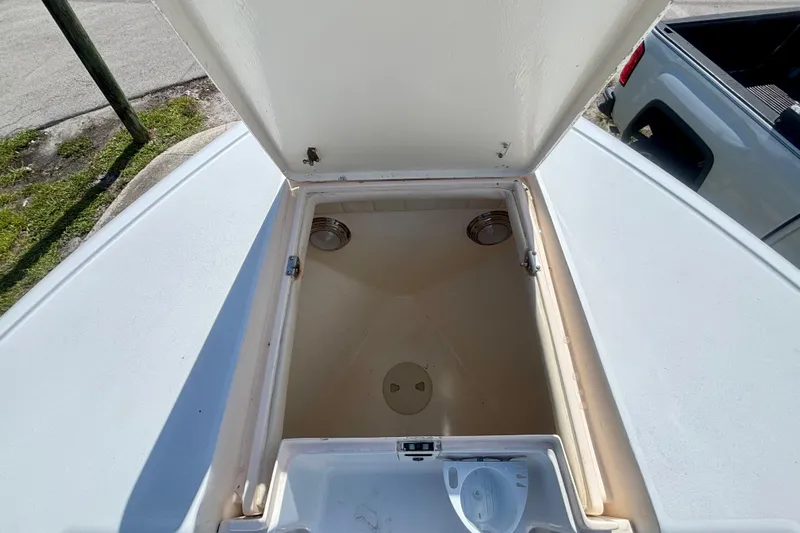  Yacht Photos Pics Open storage compartment on a 2008 Intrepid 327 Center Console boat.