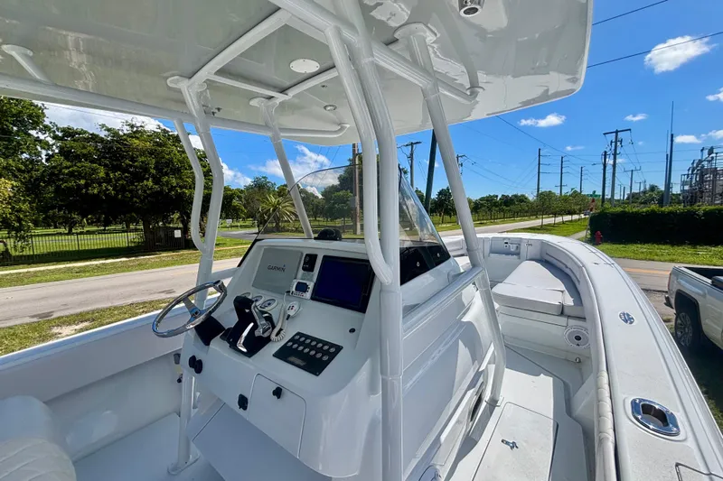  Yacht Photos Pics 2008 Intrepid 327 Center Console boat with modern helm and navigation equipment.
