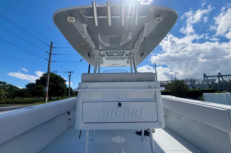  Yacht Photos Pics 2008 Intrepid 327 Center Console boat under clear blue sky.