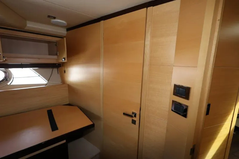  Yacht Photos Pics Interior of 2014 Sunseeker San Remo yacht with wooden cabinetry and modern design.