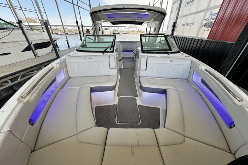  Yacht Photos Pics 2021 Sea Ray 310 SLX boat interior with luxurious seating and ambient lighting.