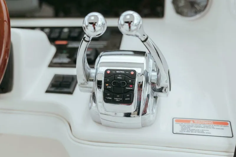 The Green Squirrel Yacht Photos Pics Chrome throttle controls on 2010 Sea Ray 390 Sedan Bridge yacht dashboard.