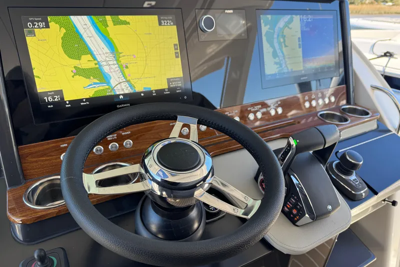 Yacht Photos Pics 2025 Tiara Yachts 38 LS helm with advanced navigation displays and controls.