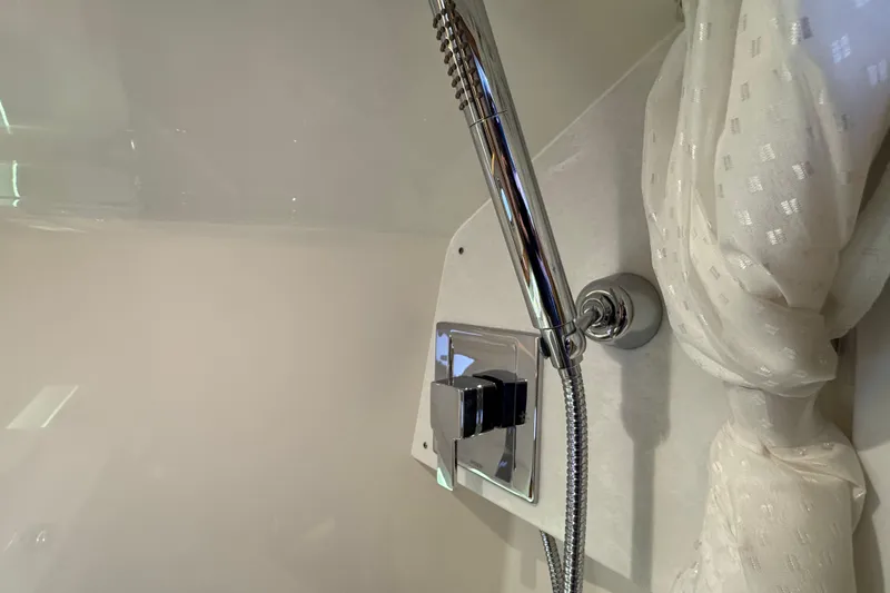  Yacht Photos Pics Luxury shower fixture in 2025 Tiara Yachts 38 LS, featuring modern chrome design.