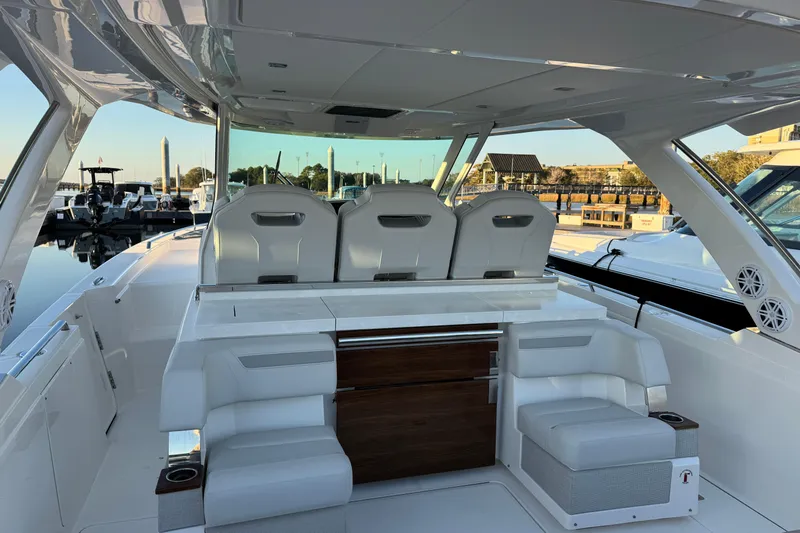 Yacht Photos Pics 2025 Tiara Yachts 38 LS luxury boat interior with seating and helm station.