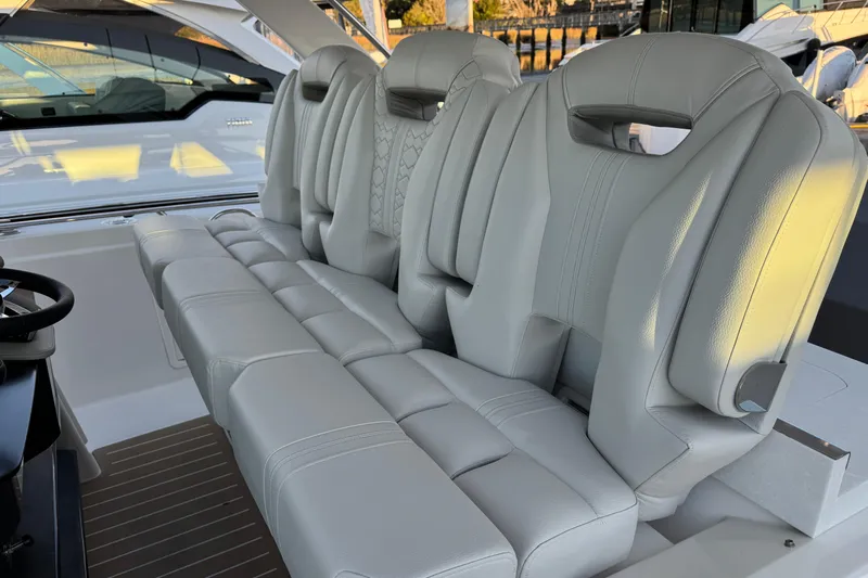  Yacht Photos Pics Luxurious seating on 2025 Tiara Yachts 38 LS, featuring elegant white leather upholstery.