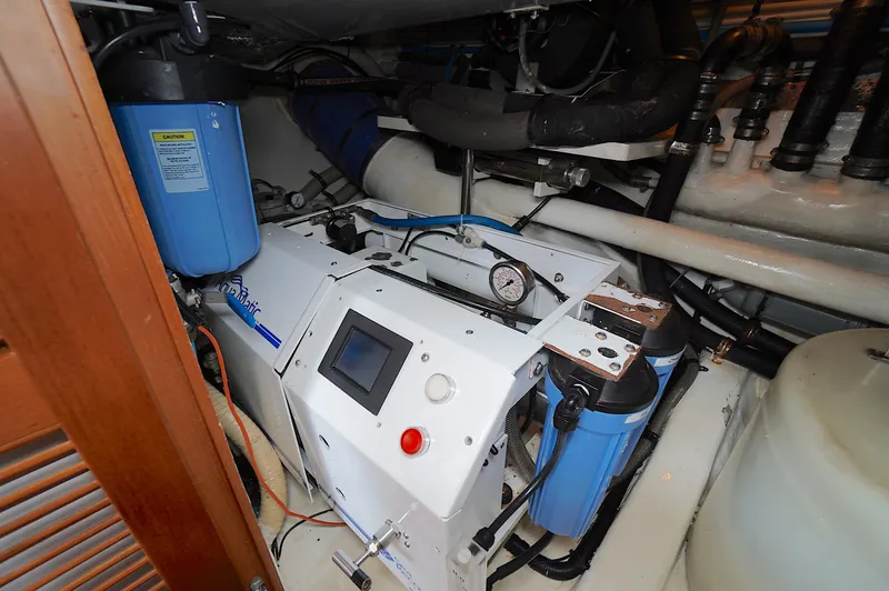 Defly Yacht Photos Pics Engine room of a 2009 Marlow 61E yacht with water filtration system.