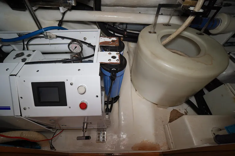 Defly Yacht Photos Pics Engine room of 2009 Marlow 61E yacht with machinery and gauges.