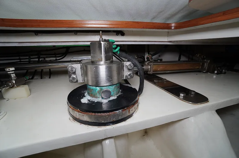 Defly Yacht Photos Pics Mechanical component inside a 2009 Marlow 61E yacht, featuring metal and wiring elements.