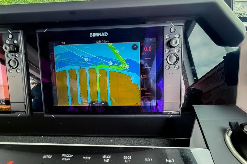  Yacht Photos Pics Simrad navigation display on 2023 Axopar 37 XC Cross Cabin boat dashboard.