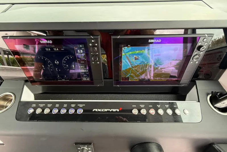  Yacht Photos Pics Control panel of 2023 Axopar 37 XC Cross Cabin with dual Simrad displays.