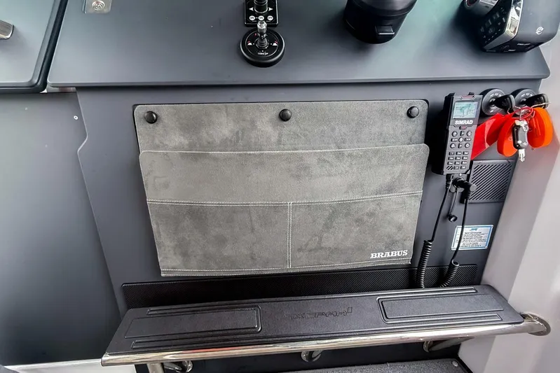  Yacht Photos Pics 2023 Axopar 37 XC Cross Cabin dashboard with Brabus detailing and communication equipment.