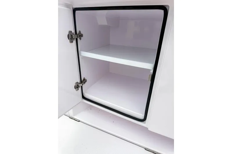  Yacht Photos Pics Open storage compartment in 2023 Axopar 37 XC Cross Cabin boat.