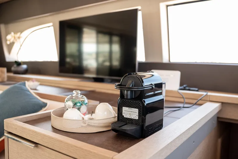  Yacht Photos Pics Modern yacht interior with coffee machine and TV, Lagoon SIXTY 5, 2024 model.
