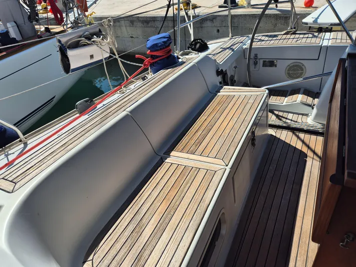 Princess Yacht Photos Pics Teak deck of 2008 Grand Soleil 45 sailboat, featuring seating and storage.