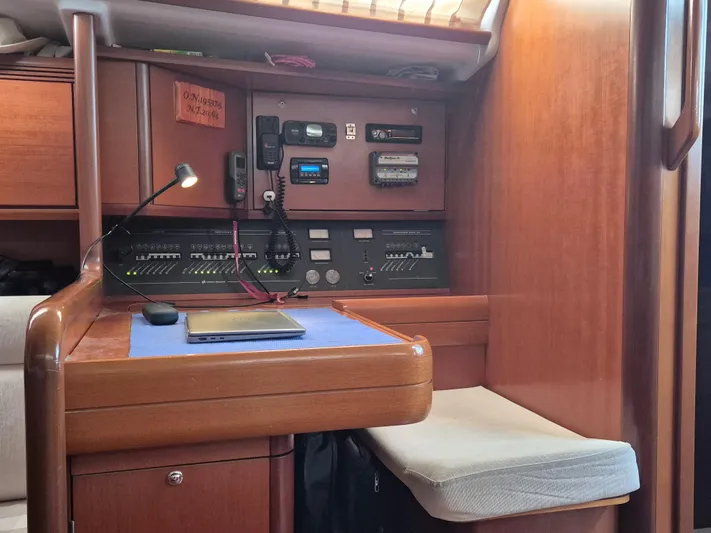 Princess Yacht Photos Pics Navigation station inside 2008 Grand Soleil 45 yacht with control panels and seating.