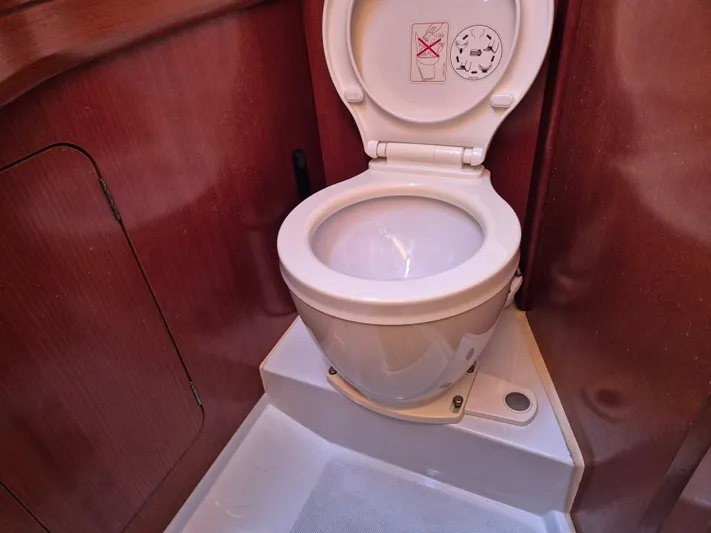 Princess Yacht Photos Pics Grand Soleil 45 yacht bathroom with a white marine toilet, 2008 model.