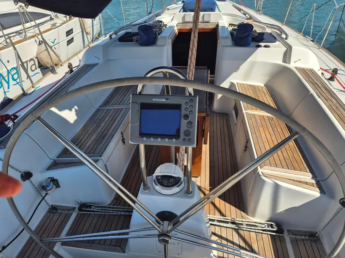 Princess Yacht Photos Pics Cockpit of 2008 Grand Soleil 45 sailboat with steering wheel and navigation equipment.