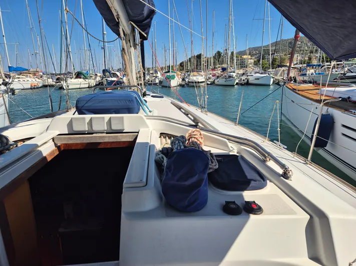 Princess Yacht Photos Pics Sailing yacht Grand Soleil 45, 2008 model, docked in a marina with clear blue skies.