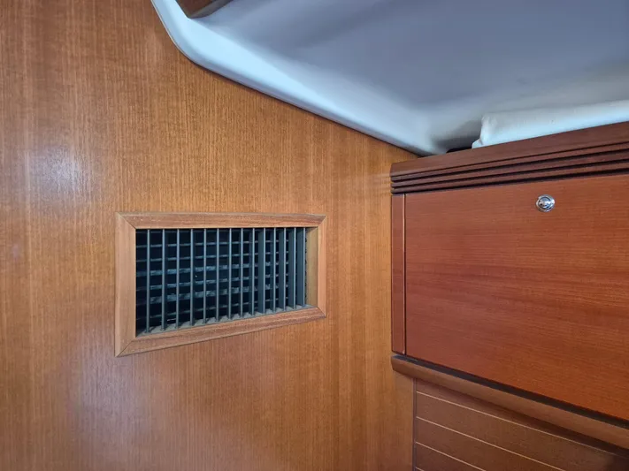 Princess Yacht Photos Pics Interior of 2008 Grand Soleil 45 yacht showing wooden paneling and ventilation grille.