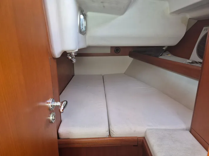 Princess Yacht Photos Pics Interior cabin of 2008 Grand Soleil 45 yacht with cozy sleeping area.