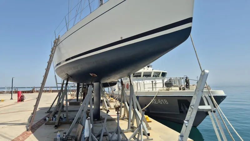 Princess Yacht Photos Pics Grand Soleil 45 yacht from 2008 on dry dock, with support structures.