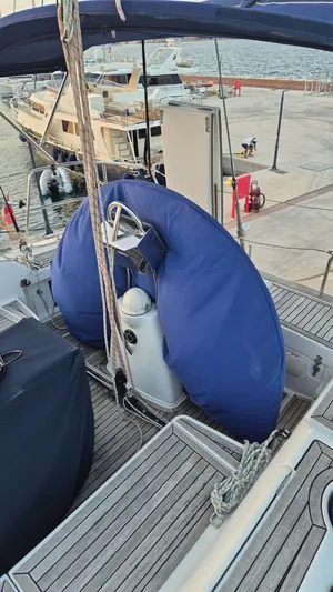 Princess Yacht Photos Pics Deck of 2008 Grand Soleil 45 sailboat with blue fender and marina view.