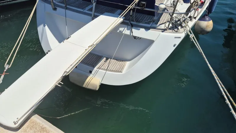 Princess Yacht Photos Pics Grand Soleil 45 yacht, 2008 model, docked with gangway extended over water.