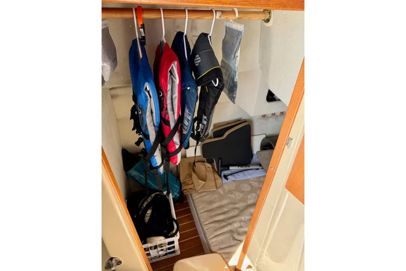  Yacht Photos Pics Interior of 2012 Ranger Tugs R-29 with life jackets and storage area.