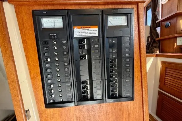  Yacht Photos Pics Electrical panel of 2012 Ranger Tugs R-29 boat, featuring switches and meters.