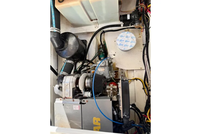  Yacht Photos Pics Engine compartment of 2012 Ranger Tugs R-29 with visible components and wiring.