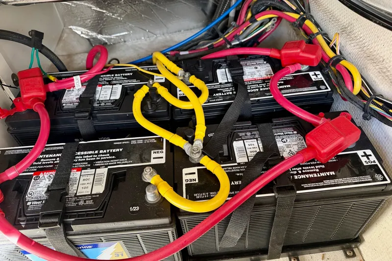  Yacht Photos Pics Battery compartment of a 2012 Ranger Tugs R-29 with connected cables.