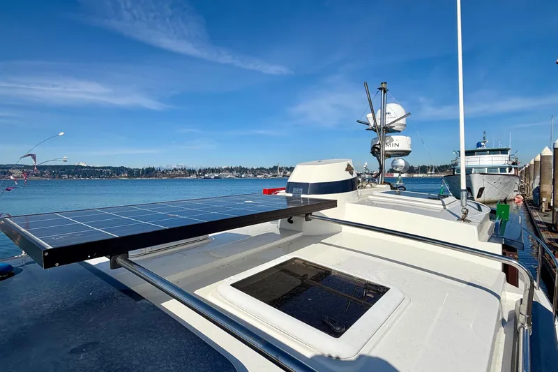  Yacht Photos Pics 2012 Ranger Tugs R-29 with solar panel, docked by the water on a sunny day.