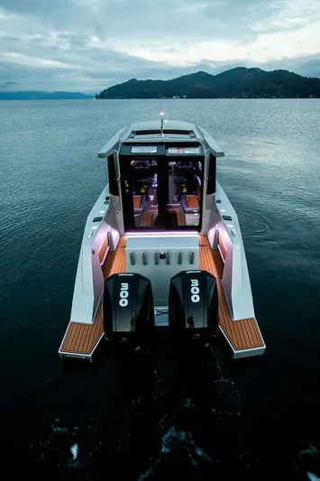  Yacht Photos Pics 2019 Jasper Marine Freedom 28 boat on serene lake with mountains in background.