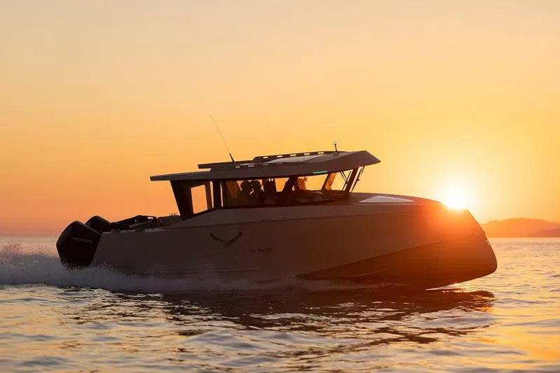  Yacht Photos Pics Jasper Marine Freedom 28 boat cruising at sunset, 2019 model.