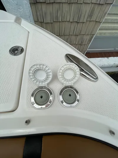  Yacht Photos Pics 2023 Chaparral 287 SSX boat deck with open fuel and water caps.