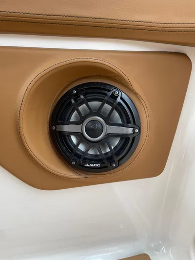  Yacht Photos Pics 2023 Chaparral 287 SSX boat speaker with tan leather trim.