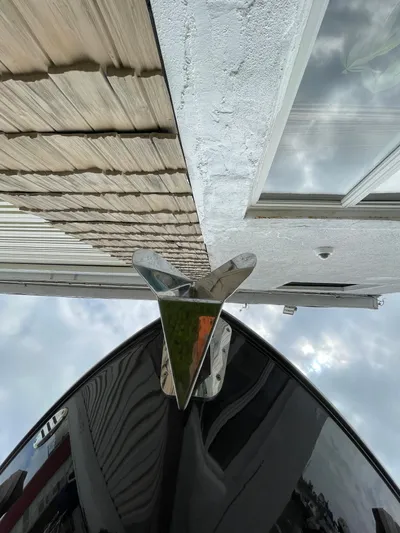  Yacht Photos Pics 2023 Chaparral 287 SSX boat bow with modern architecture reflection.