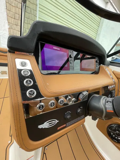  Yacht Photos Pics 2023 Chaparral 287 SSX dashboard with modern controls and dual displays.