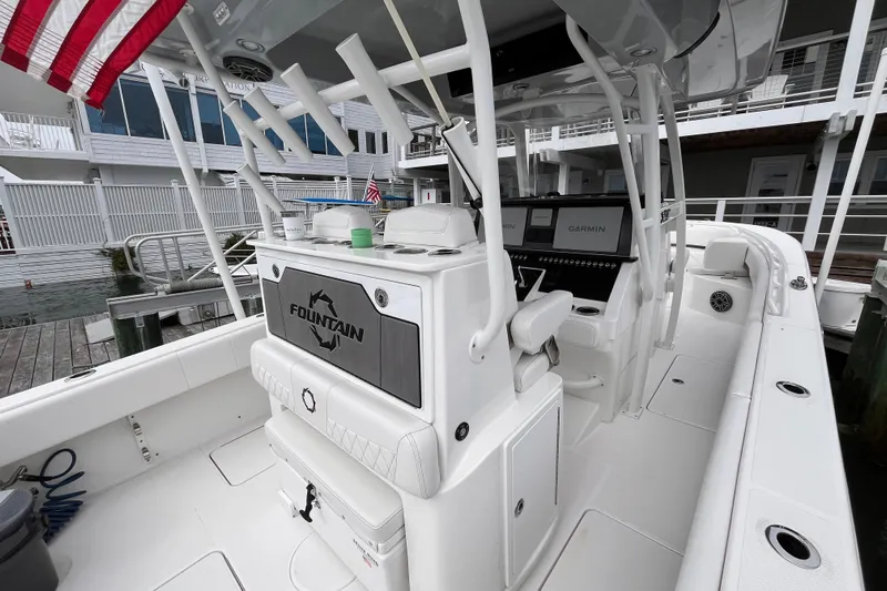  Yacht Photos Pics 2025 Fountain 34 CC boat interior with advanced Garmin navigation system.