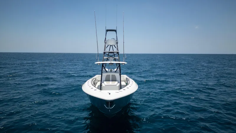 Pharma-sea Yacht Photos Pics 2023 Contender 44 CB boat on open ocean, front view.