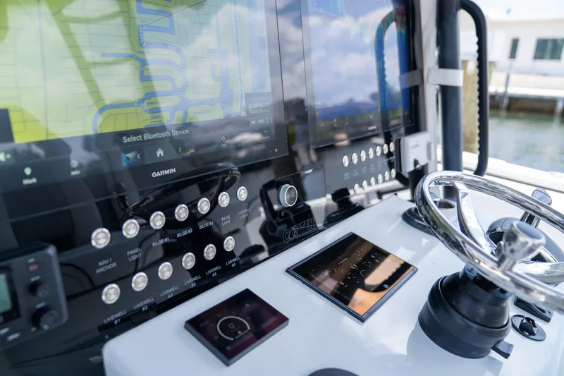 Pharma-sea Yacht Photos Pics Control panel of 2023 Contender 44 CB boat with advanced navigation systems.